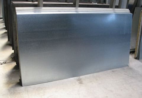 A large sheet of steel in a warehouse
