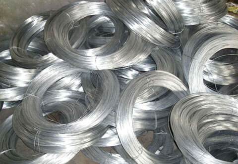A stack of galvanized steel wire coils